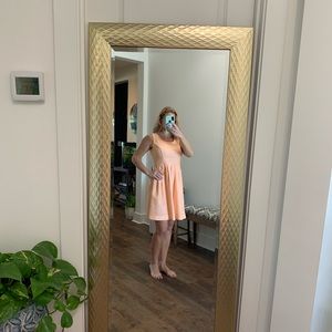 Super cute peach baby doll dress. Great for the summer time or a baby shower!